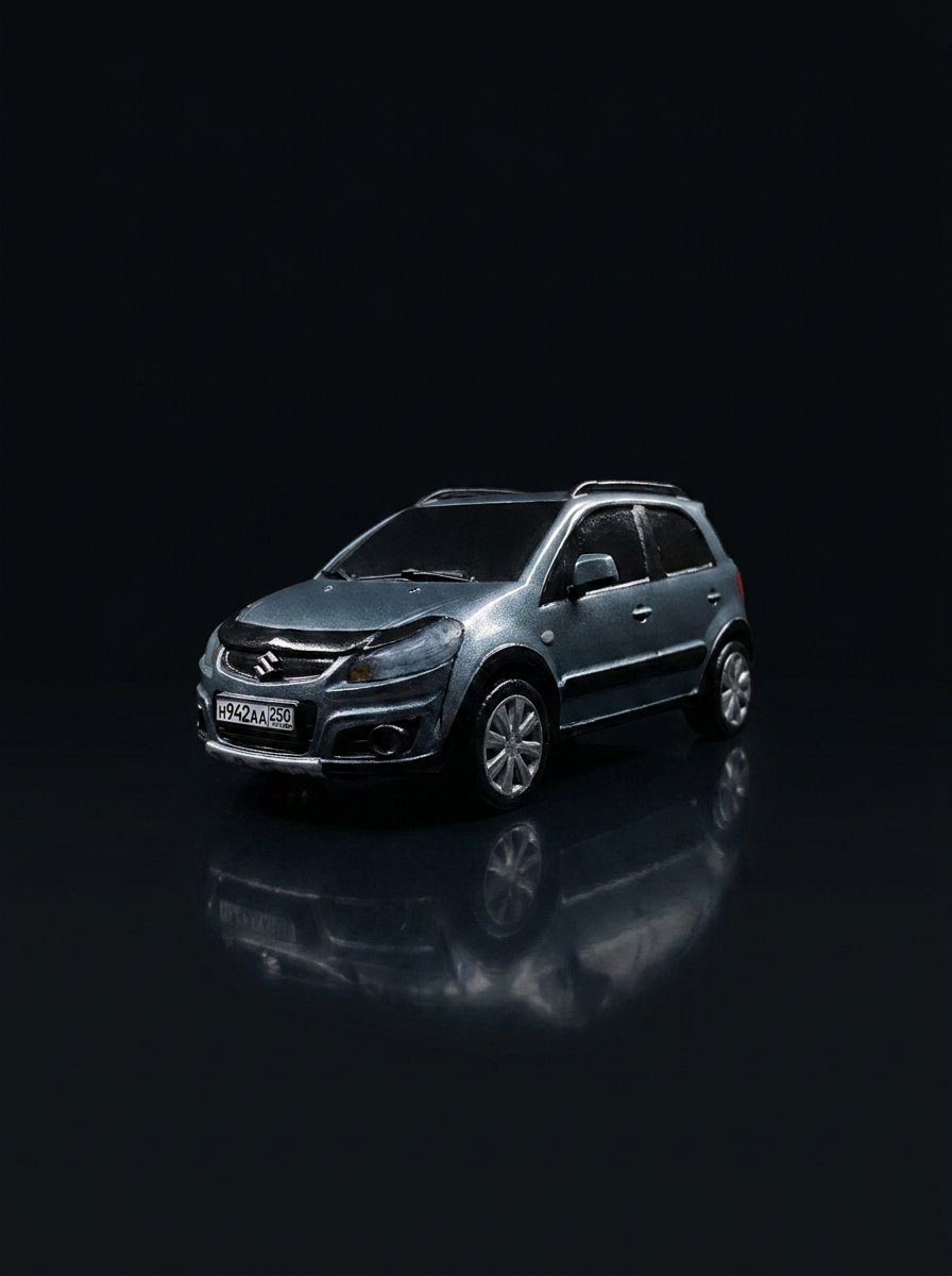 Серебристый Suzuki Vitara после восстановления лакокрасочного покрытия