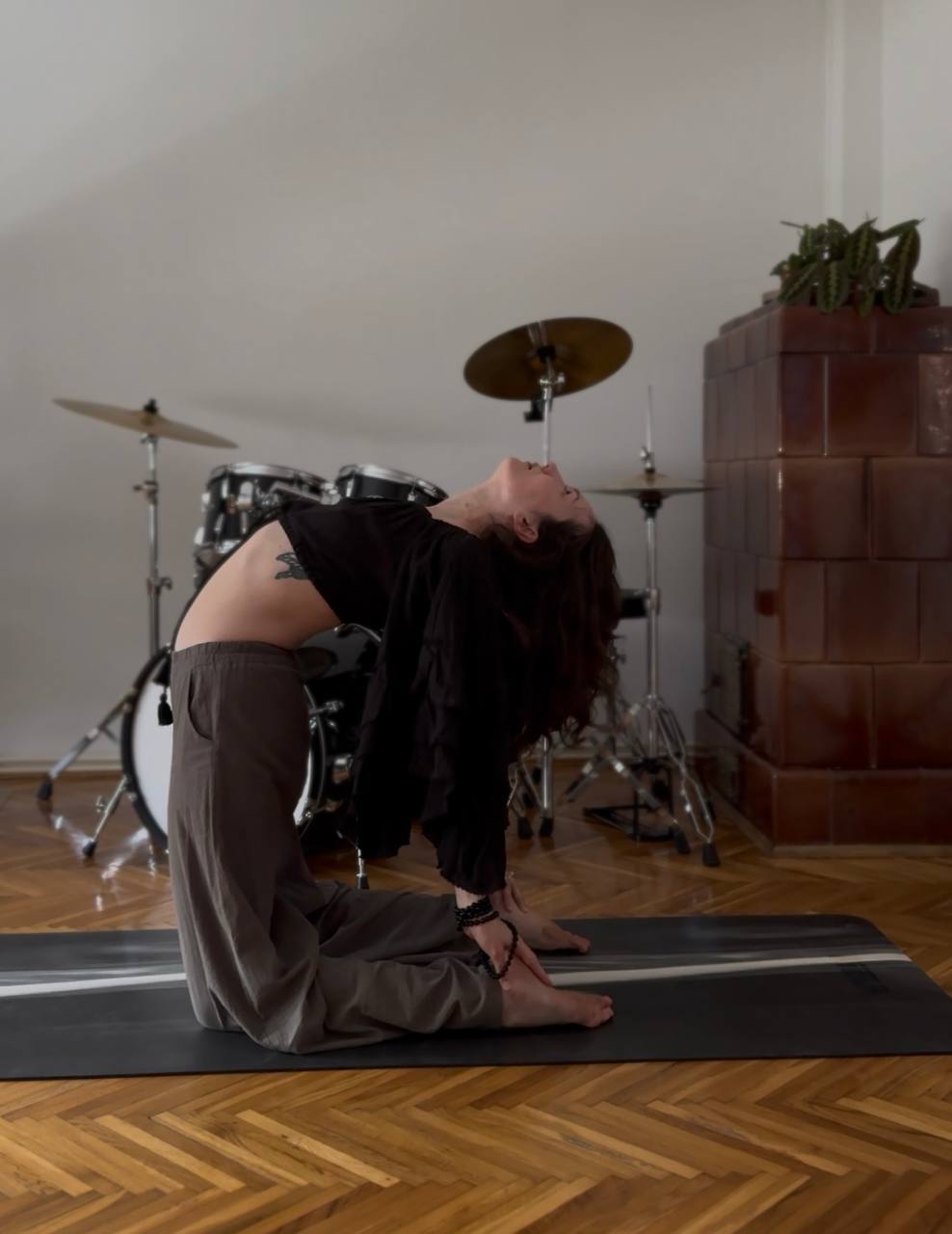 Kate practicing yoga