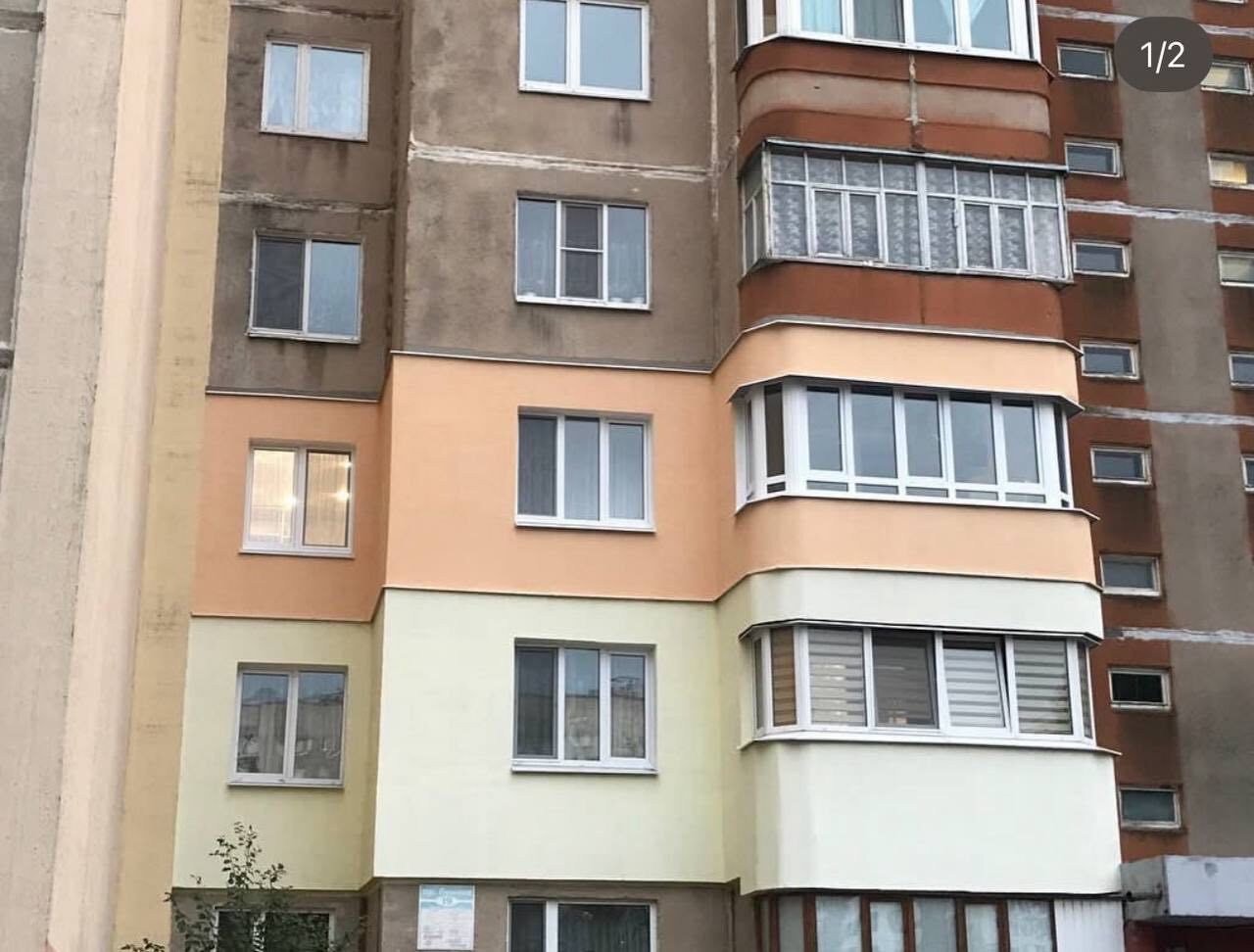 Комплексное утепление фасада многоэтажного дома вокруг балконов