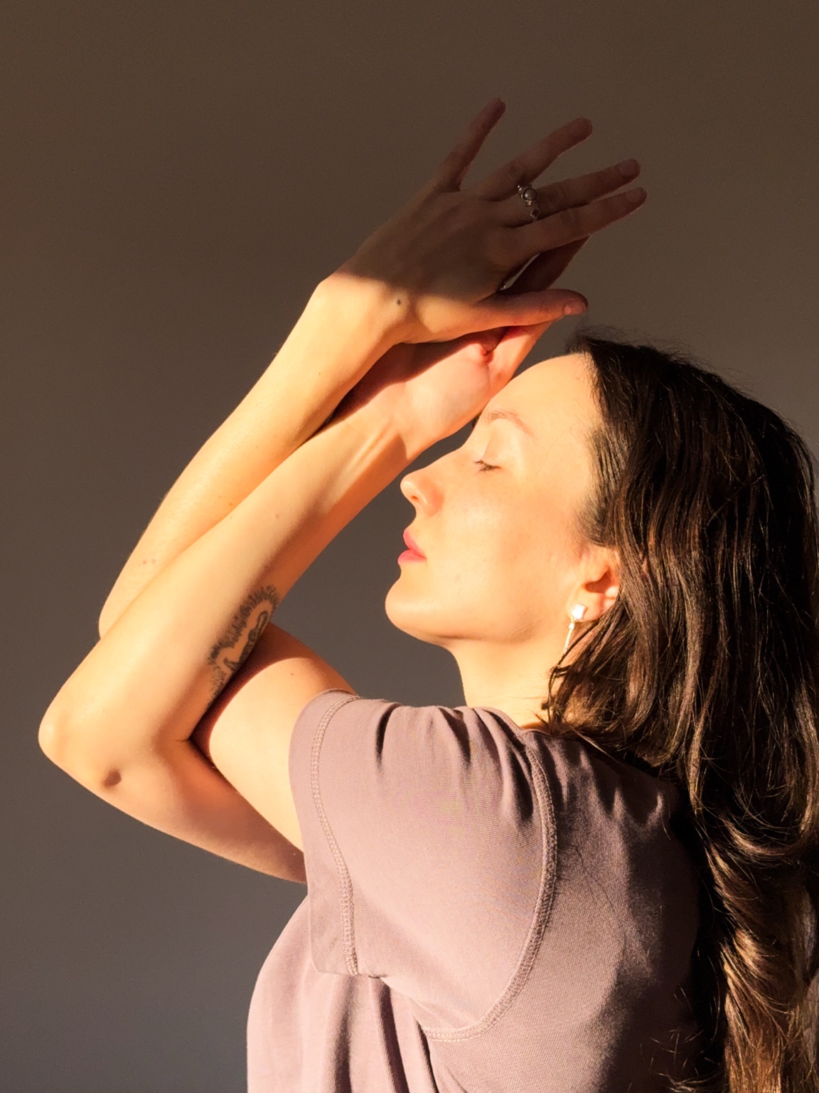 Yoga teacher in natural setting