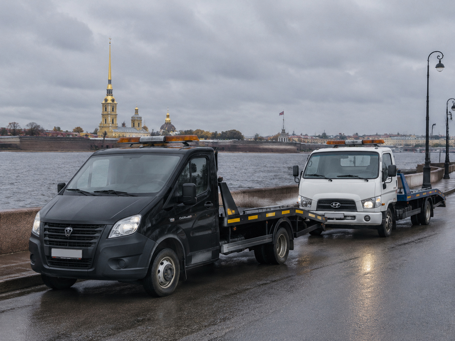Эвакуаторы парка ТРОС — чёрная ГАЗ-3302 Бизнес и белый Hyundai HD 72